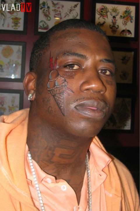 gucci tattoo on face. Neck tattoos and face tattoos.